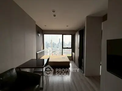 Modern studio apartment with city view and stylish interior design