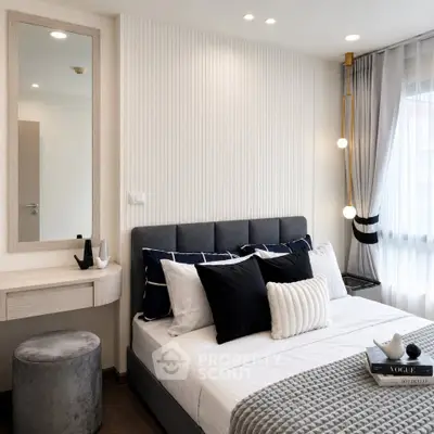 Modern bedroom with stylish decor and natural light