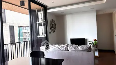 Modern living room with balcony view and stylish decor