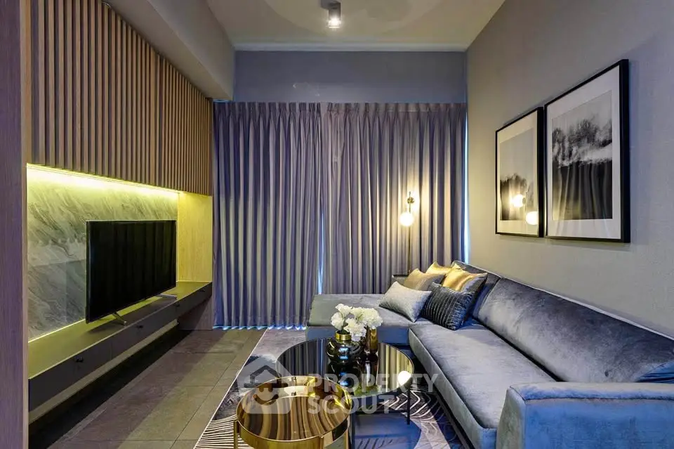 Luxurious modern living room with elegant decor and ambient lighting