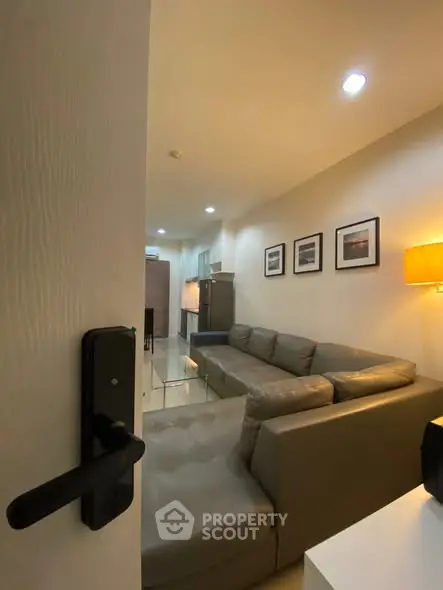 Modern living room with cozy sectional sofa and ambient lighting