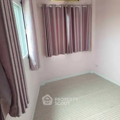 Cozy empty room with pink curtains and tiled floor, perfect for customization.