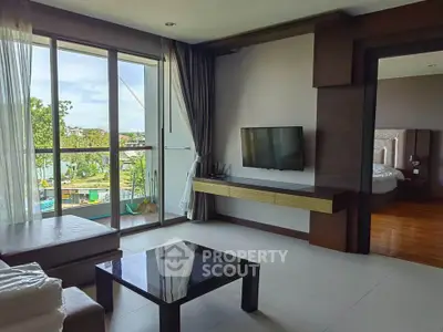 Modern living room with large windows and stylish decor