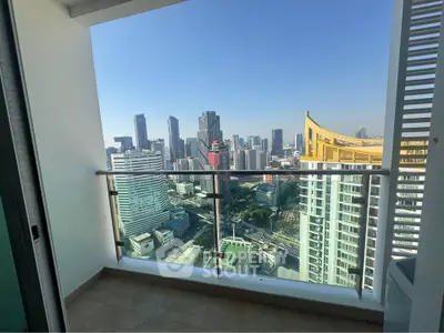 Stunning cityscape view from a high-rise balcony, perfect for urban living.