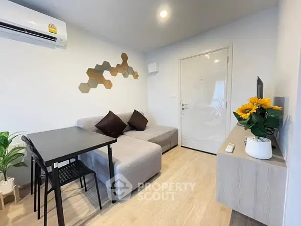 Modern living room with stylish decor and cozy seating area