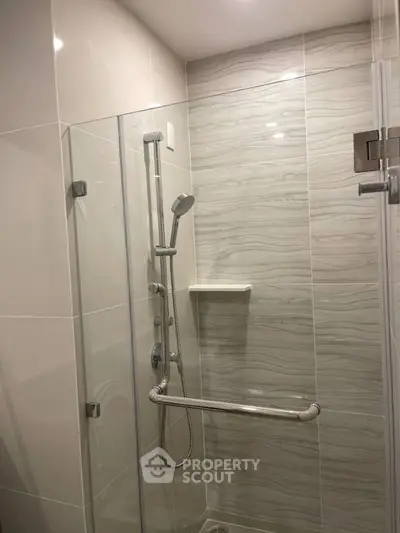 Modern bathroom with sleek shower design and elegant tile work
