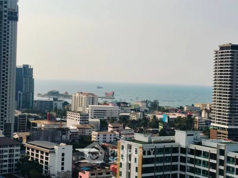 Stunning cityscape with ocean view from high-rise buildings, ideal for urban living enthusiasts.