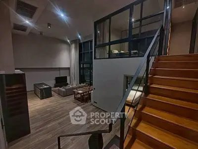 Luxurious modern loft with open living space and elegant staircase