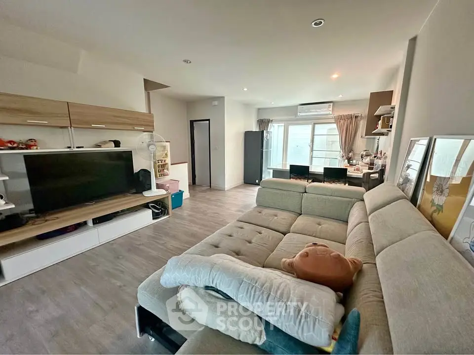 Spacious modern living room with stylish furniture and natural light