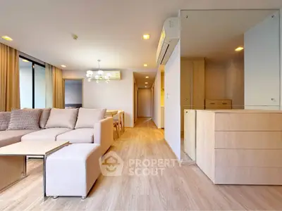 Spacious modern living room with elegant decor and natural lighting