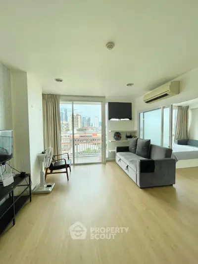 Spacious modern living room with city view and open layout