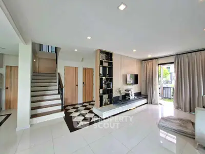 Spacious modern living room with elegant decor and natural light