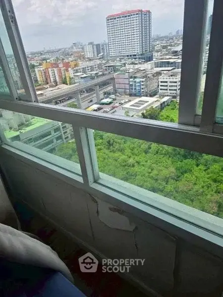 High-rise apartment with panoramic city view and large windows