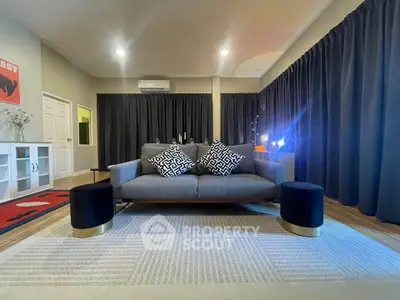 Spacious modern living room with stylish sofa and elegant decor