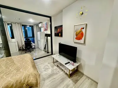 Modern studio apartment with stylish decor and city view