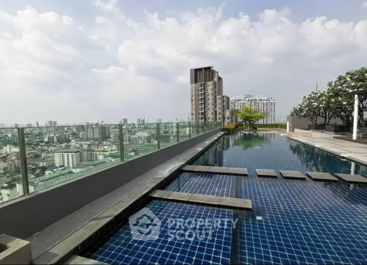 Stunning rooftop pool with panoramic city views and modern design.