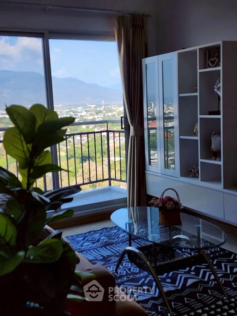 Stylish living room with stunning mountain view and modern decor