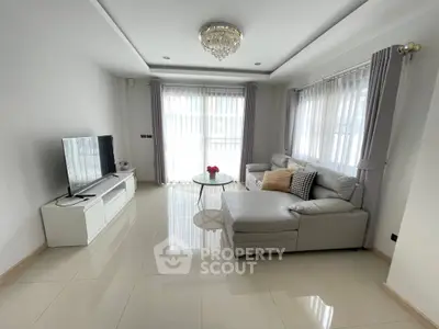 Elegant living room with modern decor and natural light