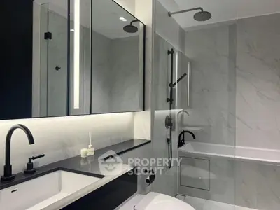 Luxurious modern bathroom with sleek fixtures and elegant marble tiles