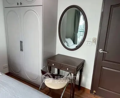 Stylish bedroom corner with elegant wardrobe and vanity mirror
