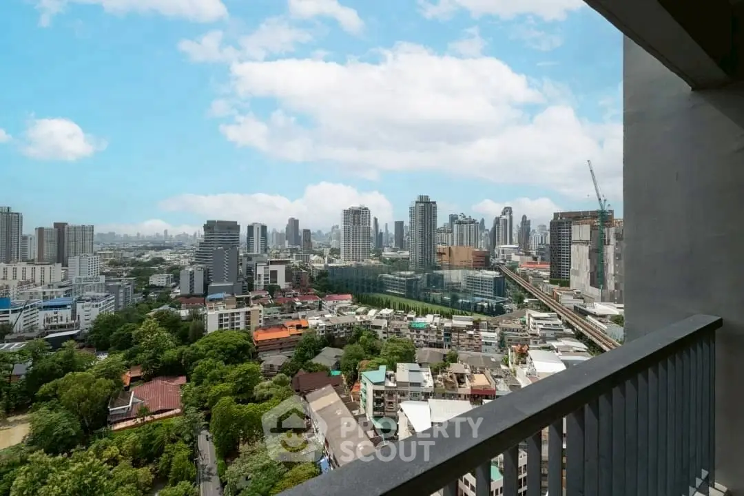 Stunning cityscape view from high-rise balcony in urban setting