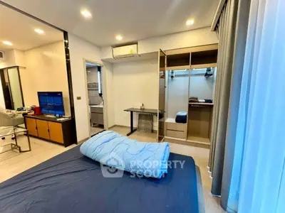 Modern bedroom with open closet and air conditioning in stylish apartment