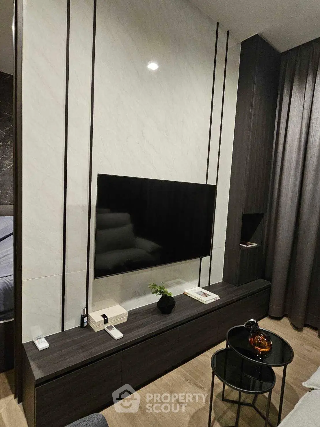 Modern living room with sleek TV setup and stylish decor