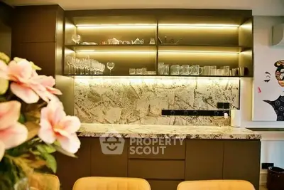 Luxurious modern kitchen with elegant marble countertop and ambient lighting