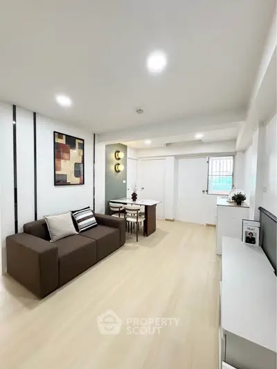 Modern living room with sleek design and cozy ambiance