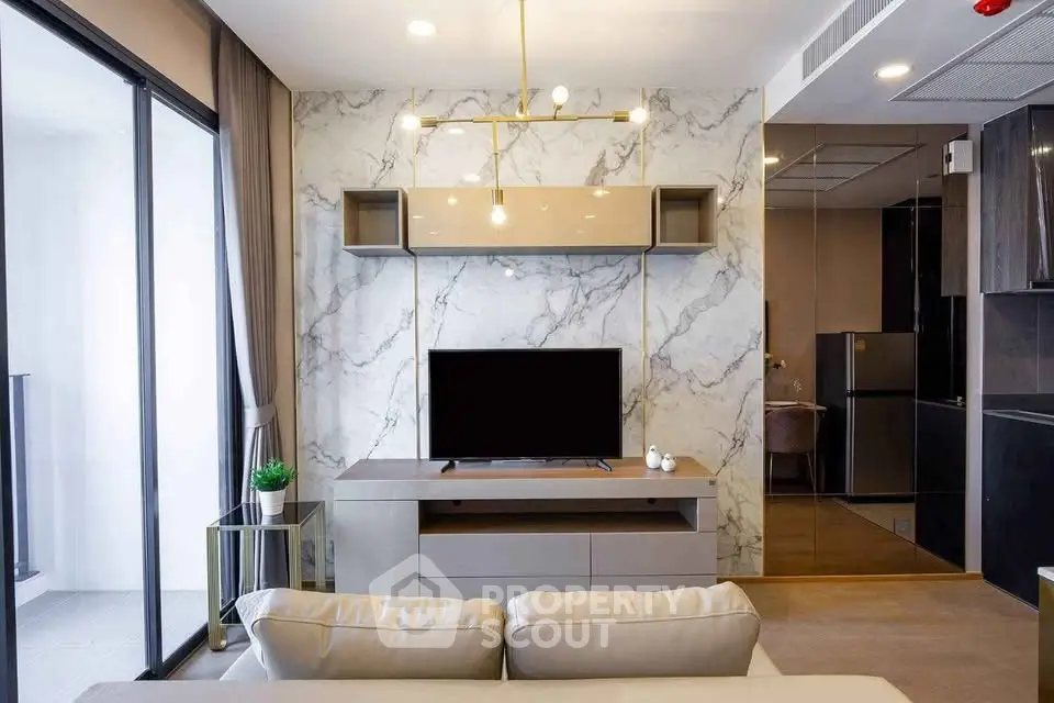 Modern living room with marble accent wall and sleek furniture