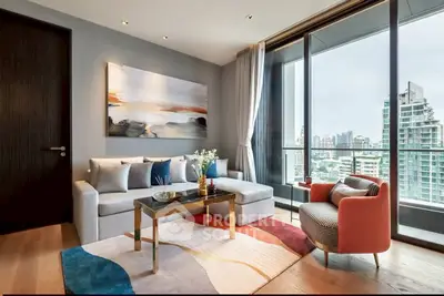 Modern living room with city view, stylish furniture, and large windows in a high-rise apartment.