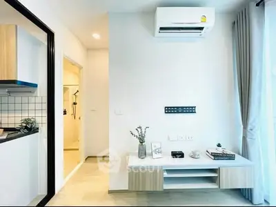 Modern living room with air conditioning and stylish decor in a contemporary apartment.