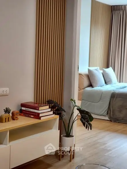 Stylish modern bedroom with cozy decor and wooden accents