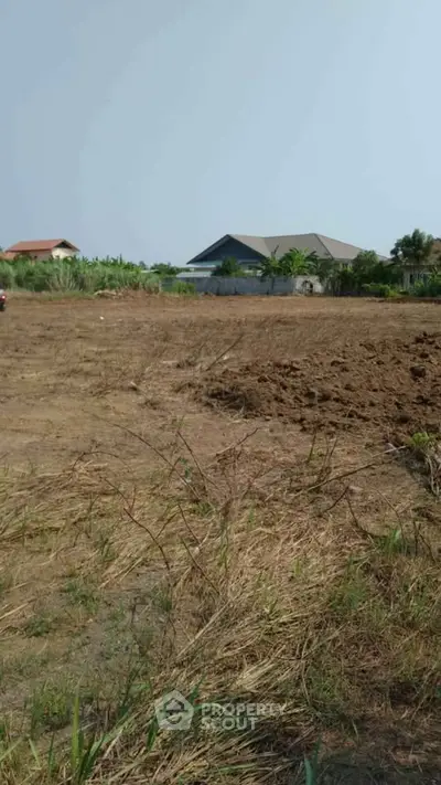 Spacious land plot with potential for development in a serene neighborhood.