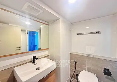 Modern bathroom with sleek fixtures and spacious design