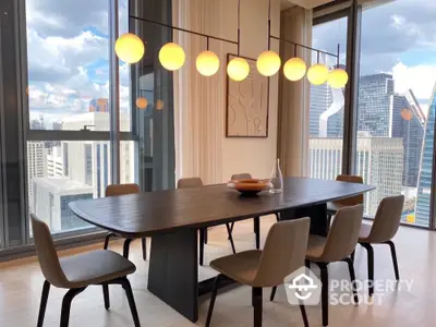 Luxurious dining area with stunning city view and modern lighting