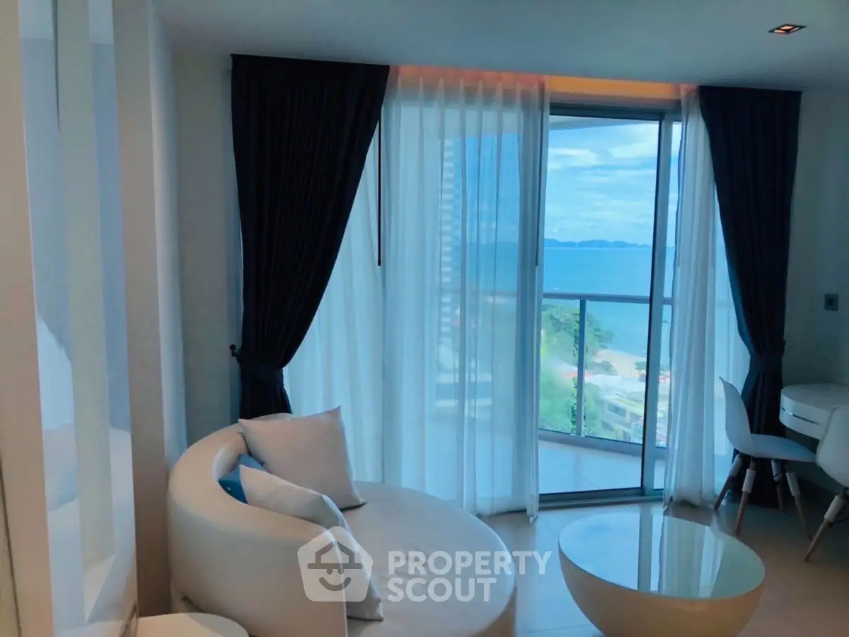 Luxurious living room with stunning ocean view and modern furniture