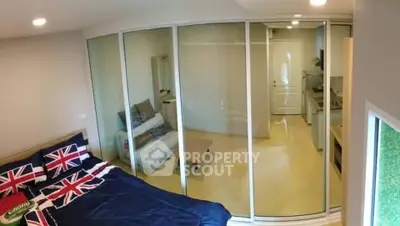 Modern bedroom with glass partition and stylish decor