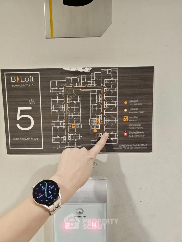 Modern fire escape plan in a stylish building with sleek design elements and clear layout.