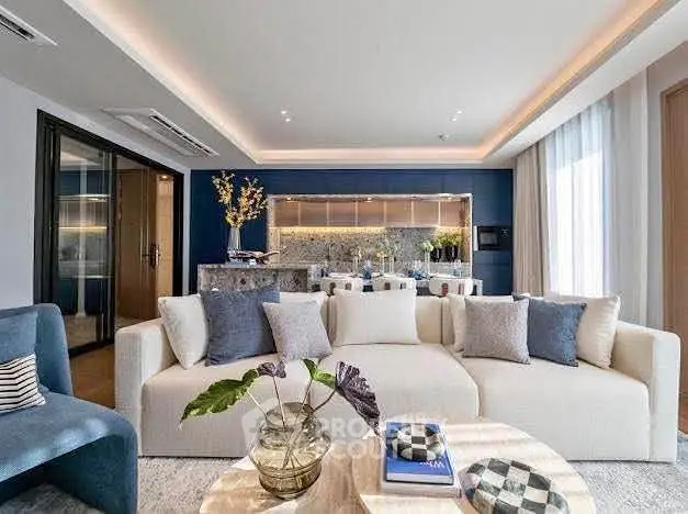 Luxurious modern living room with elegant decor and open kitchen layout