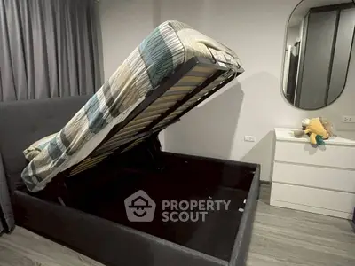 Modern bedroom with storage bed and stylish decor