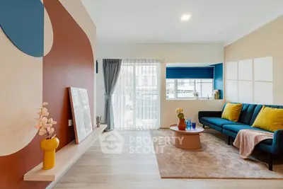 Stylish modern living room with colorful decor and natural light