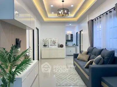 Modern living room with elegant lighting and stylish decor