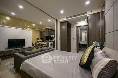 Luxurious modern studio apartment with open layout, featuring stylish decor and high-end appliances.