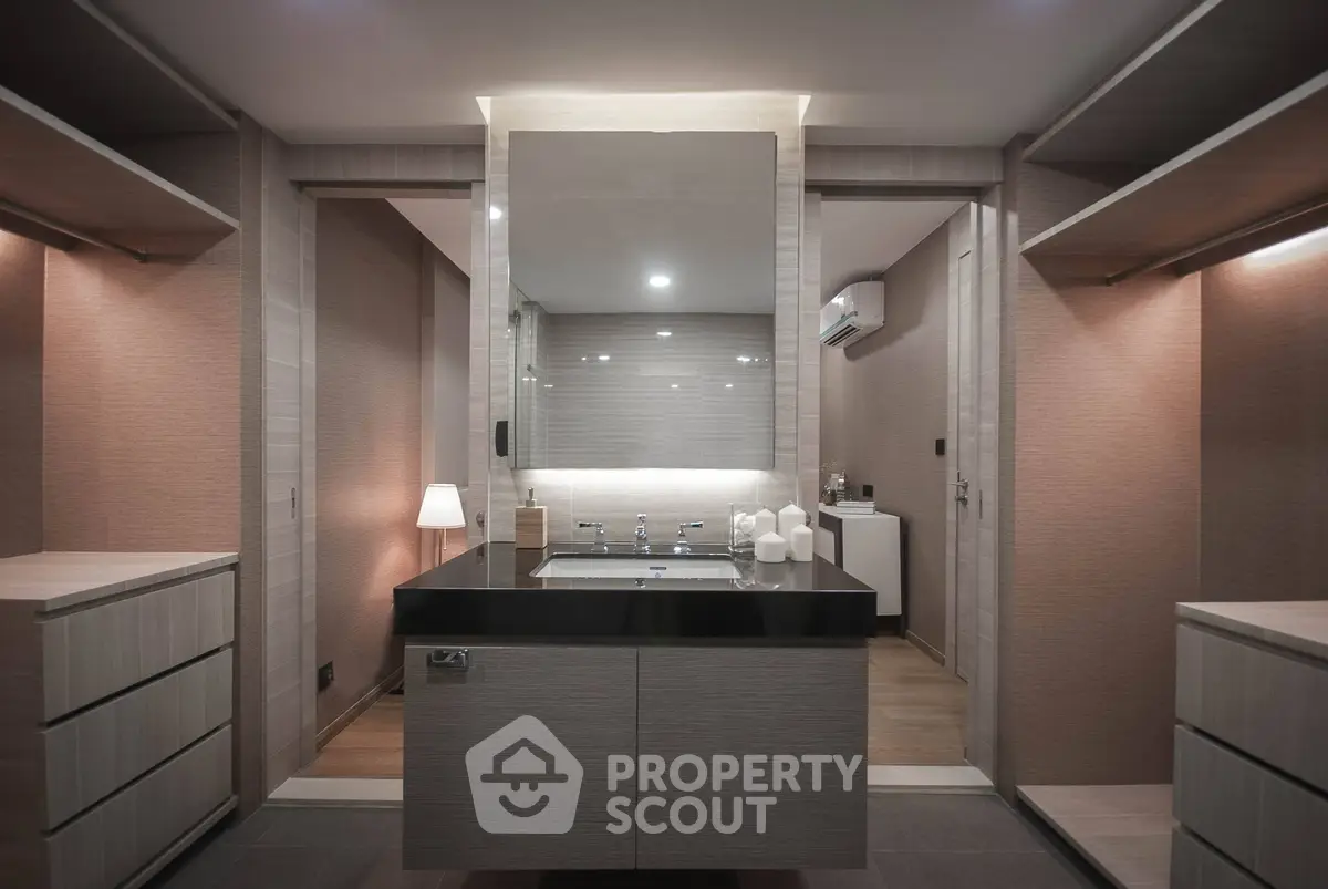 Luxurious modern bathroom with sleek design and ambient lighting
