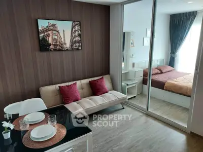 Modern apartment interior with cozy living room and stylish bedroom, featuring elegant decor and natural light.