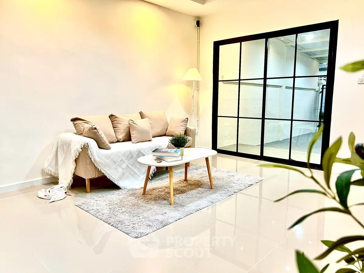 Modern living room with cozy sofa, stylish coffee table, and elegant decor