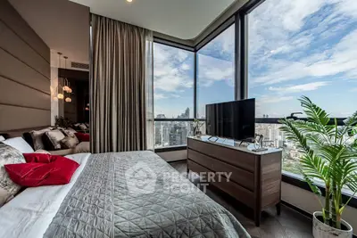 Luxurious bedroom with panoramic city view and modern decor