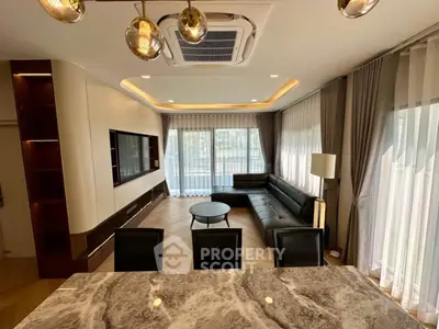 Luxurious modern living room with elegant decor and spacious seating area