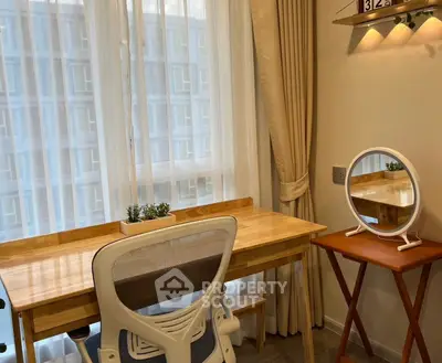Modern study room with elegant wooden desk and ergonomic chair, perfect for productivity and comfort.